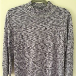 Purple sweater with geometric design